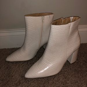 Brand new express snakeskin booties